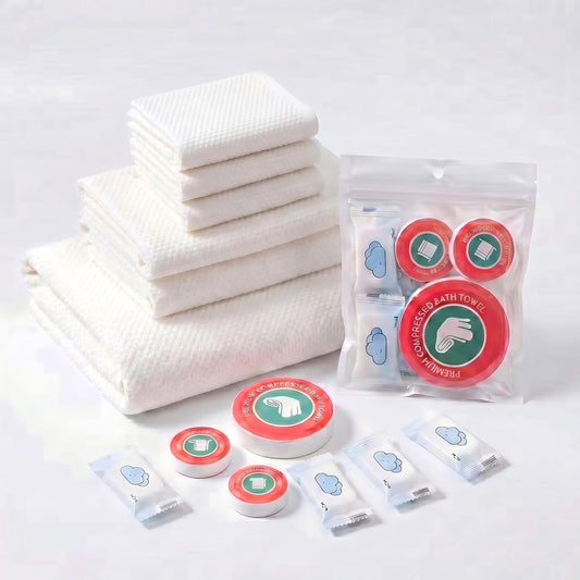 7-Pack Lightweight Disposable Compressed Travel Towel Set, 3 Sizes | 1-day kit: 1 bath-size body, 2 hand & 4 face towels; 90gsm non-terry material, individually wrapped for travel.